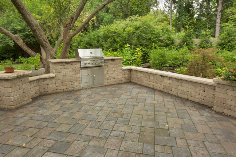 Outdoor living space with grill area in Indianapolis, Indiana designed and installed by Aspen Outdoor Designs.