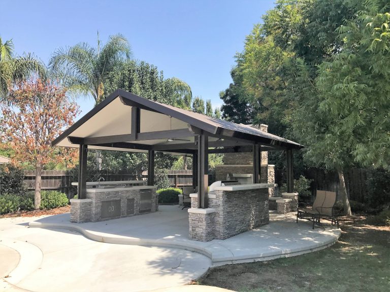 Outdoor patio and pavilion. Outdoor kitchen and bar. Outdoor living room with fireplace.