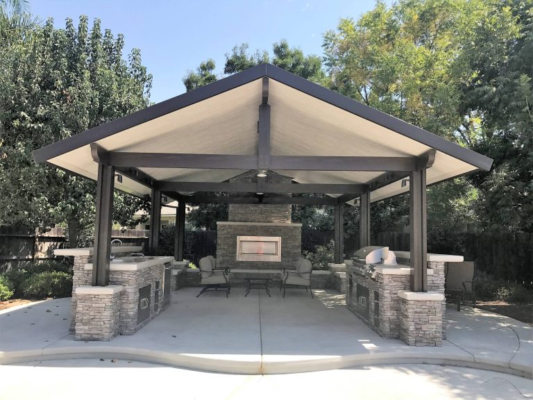 Outdoor patio and pavilion. Outdoor kitchen and bar. Outdoor living room with fireplace.