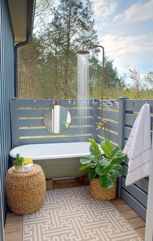 Outdoor shower deck - coastal outdoor shower deck idea in Nashville with no cover