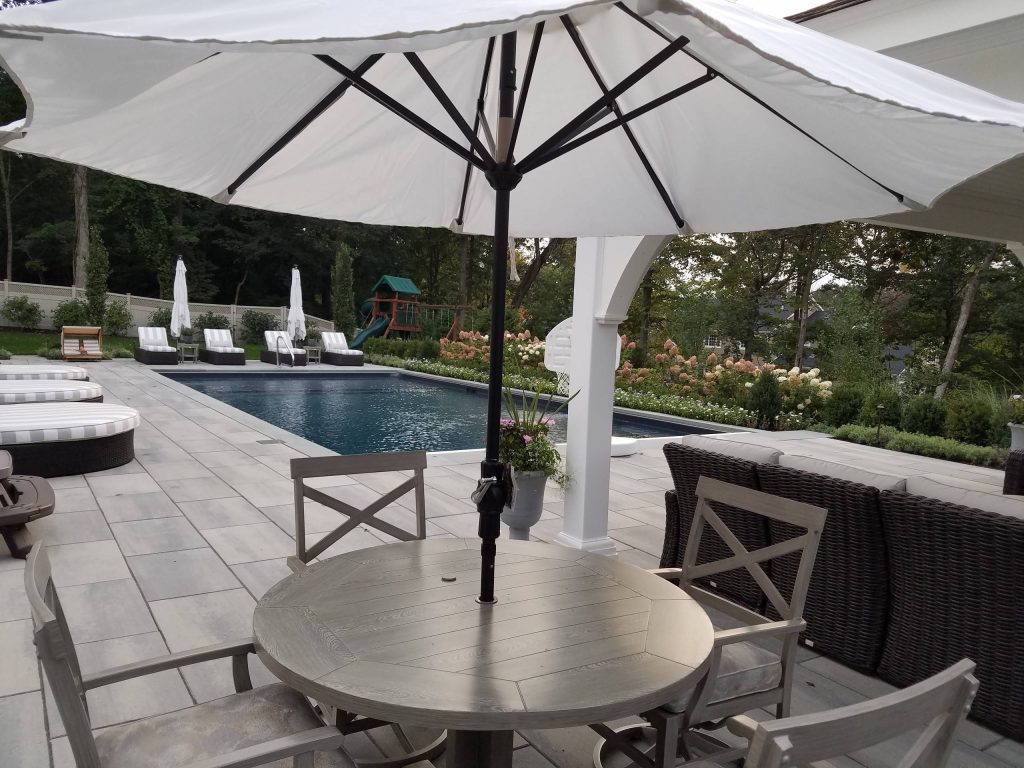 Patio kitchen - backyard patio kitchen idea in New York