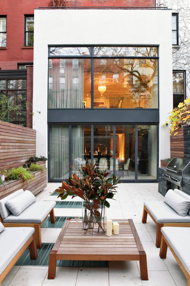 Patio kitchen - contemporary backyard patio kitchen idea in New York with no cover