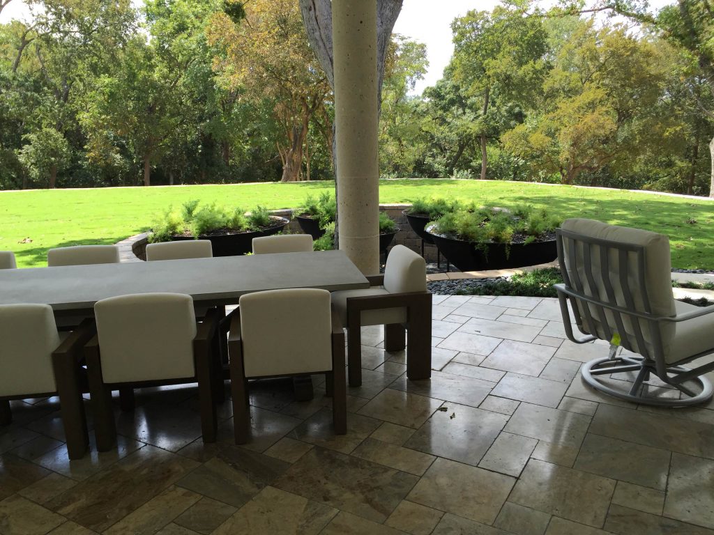 Patio kitchen - huge traditional backyard concrete paver patio kitchen idea in Austin with a roof extension