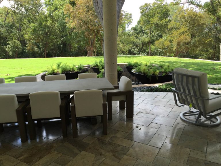 Patio kitchen - huge traditional backyard concrete paver patio kitchen idea in Austin with a roof extension