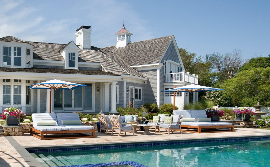 Patio kitchen - large coastal backyard tile patio kitchen idea in Boston with a pergola