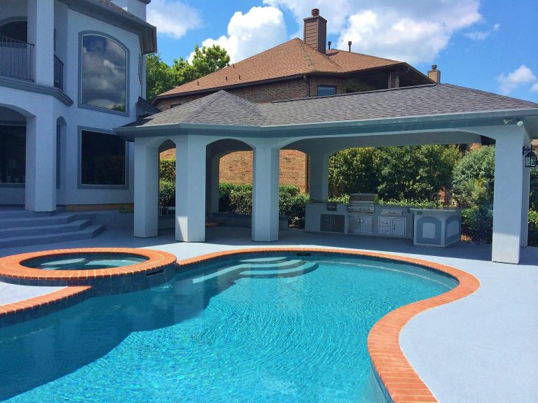 Patio kitchen - large contemporary backyard brick patio kitchen idea in Houston with a gazebo