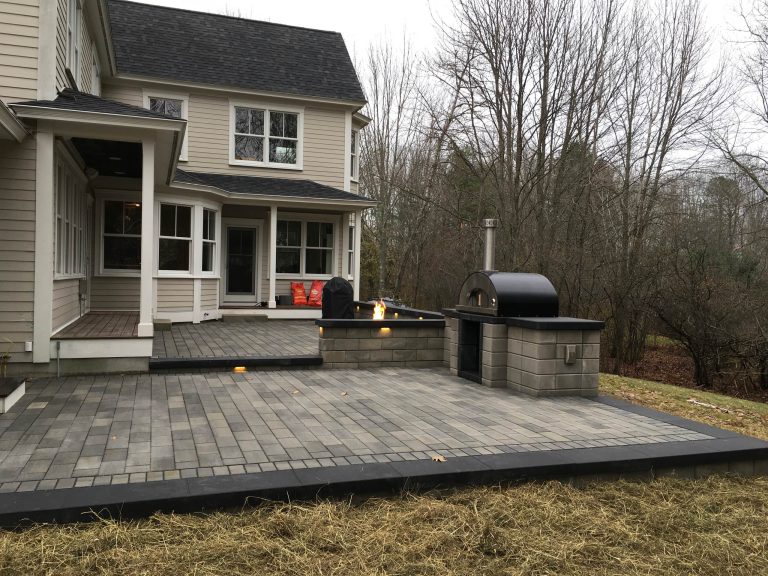 Patio kitchen - large contemporary backyard concrete paver patio kitchen idea in Portland Maine