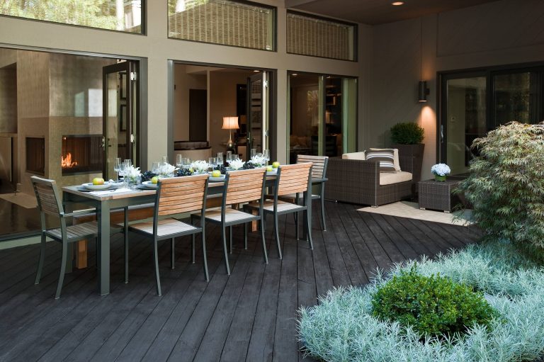 Patio kitchen - large contemporary backyard tile patio kitchen idea in Chicago with no cover
