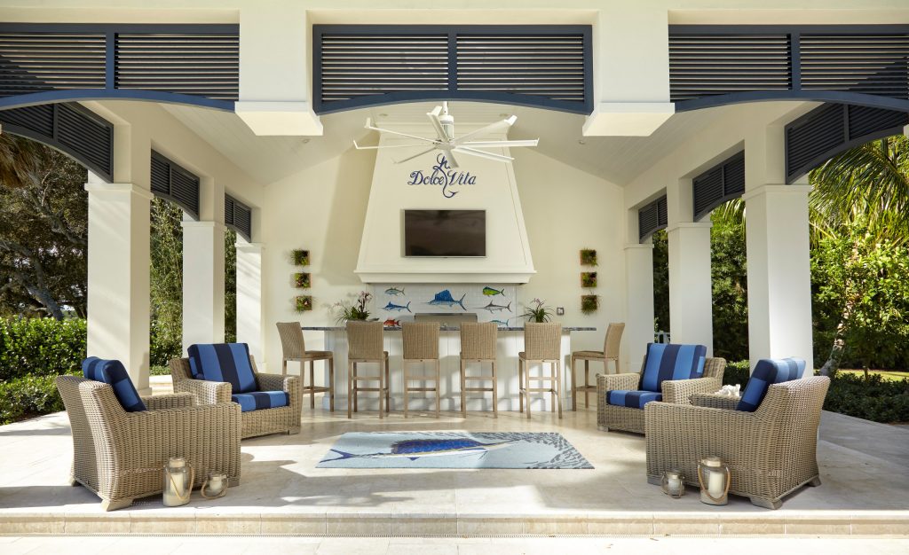 Patio kitchen - large contemporary backyard tile patio kitchen idea in Miami with a roof extension