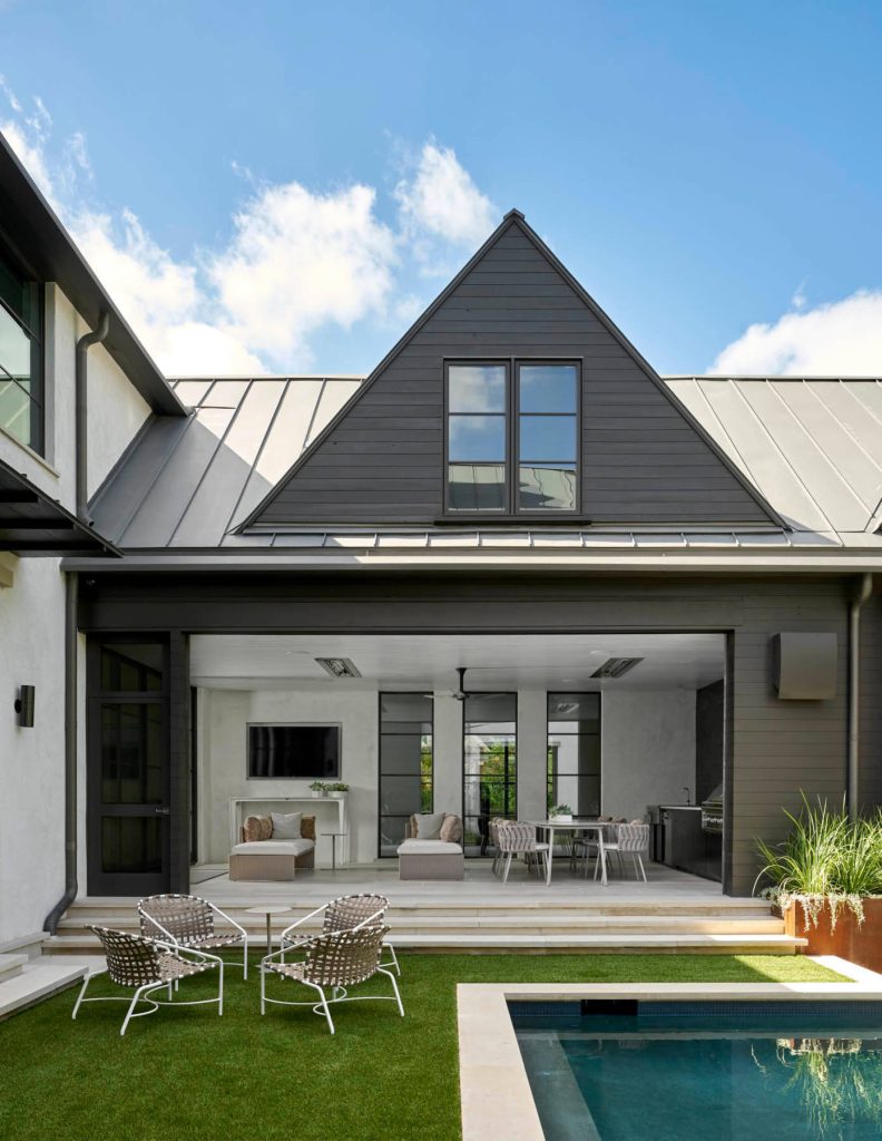 Patio kitchen - large contemporary courtyard concrete paver patio kitchen idea in Dallas with no cover