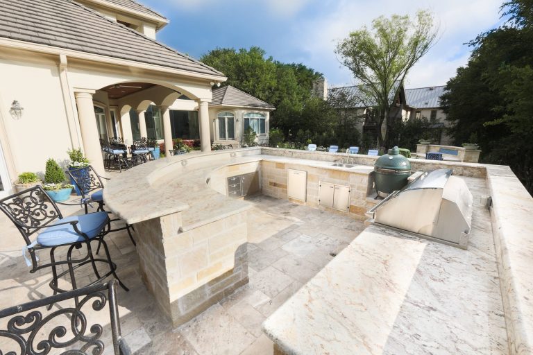 Patio kitchen - large mediterranean backyard tile patio kitchen idea with no cover