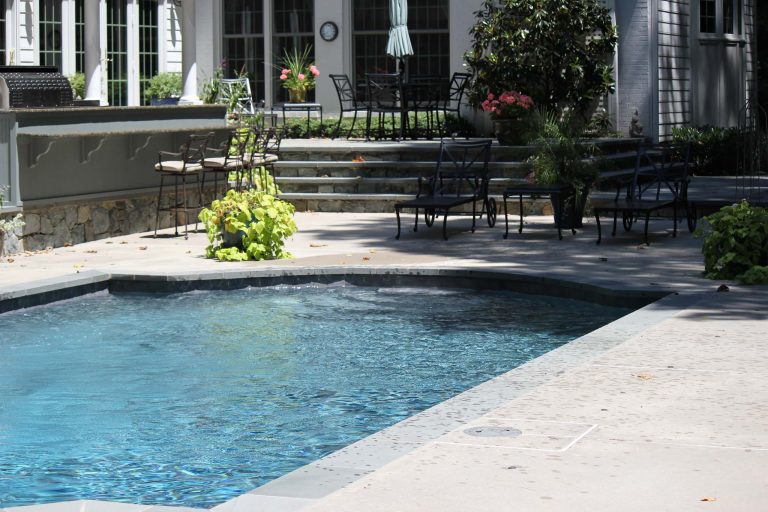 Patio kitchen - large traditional backyard concrete patio kitchen idea in DC Metro