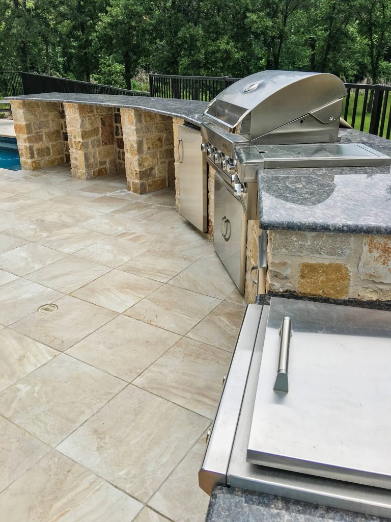 Patio kitchen - large traditional backyard tile patio kitchen idea in Dallas with no cover