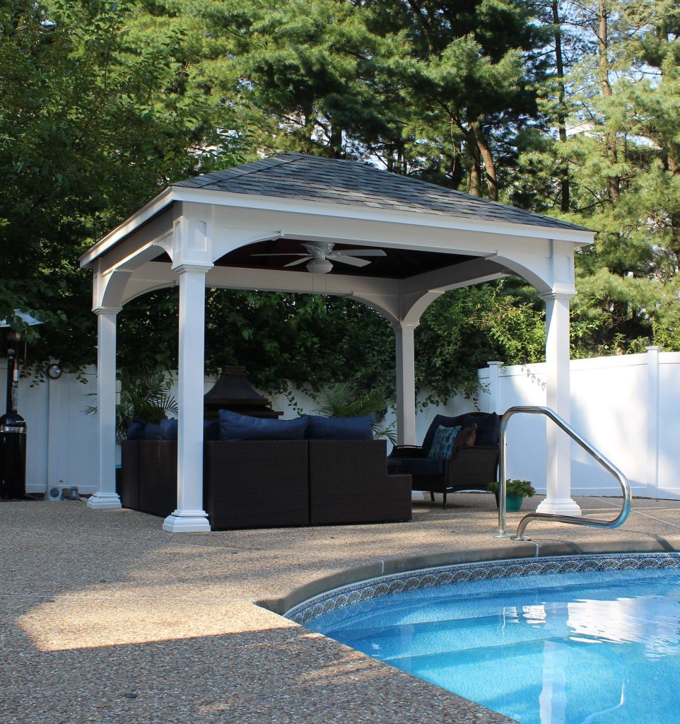 Patio kitchen - large transitional backyard stone patio kitchen idea in Boston with a gazebo