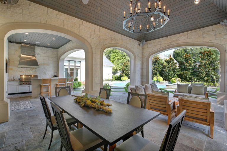 Patio kitchen - mediterranean patio kitchen idea in Dallas with a roof extension