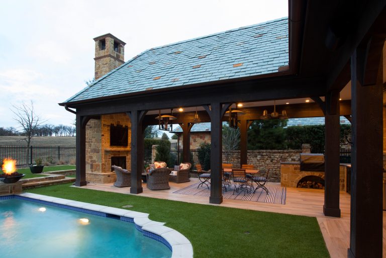 Patio kitchen - mid-sized 1950s backyard patio kitchen idea in Dallas with decking and a roof extension