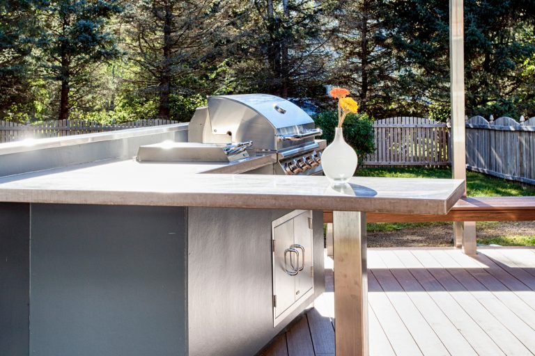 Patio kitchen - mid-sized 1960s backyard patio kitchen idea in Philadelphia with decking and no cover