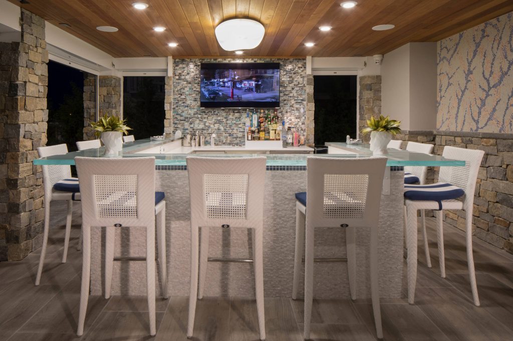 Patio kitchen - mid-sized coastal backyard stone patio kitchen idea in Philadelphia with a roof extension