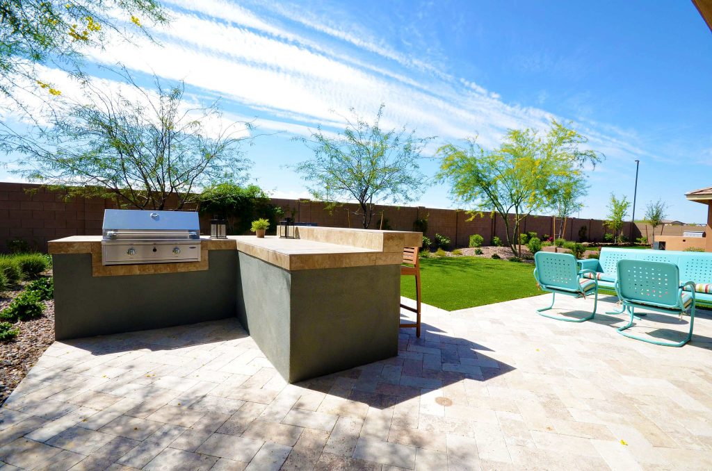 Patio kitchen - mid-sized contemporary backyard brick patio kitchen idea in Phoenix