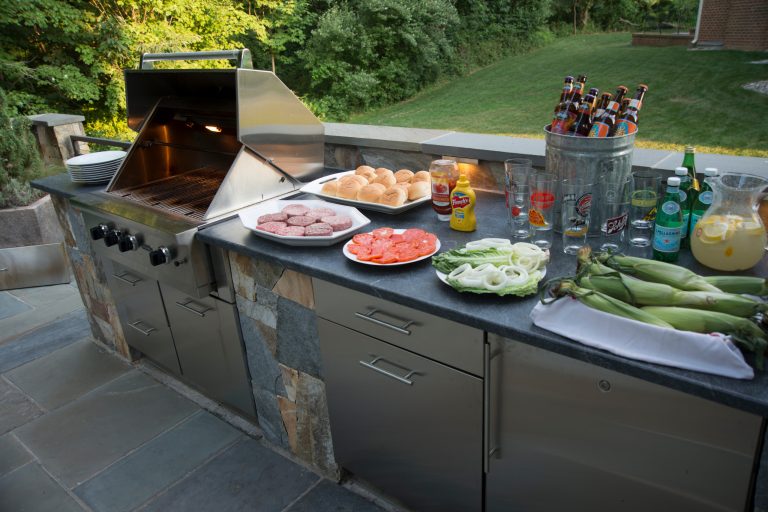 Patio kitchen - mid-sized contemporary backyard patio kitchen idea in DC Metro with no cover
