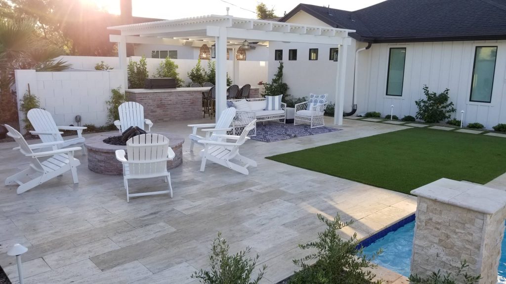 Patio kitchen - mid-sized country backyard tile patio kitchen idea in Phoenix with a pergola