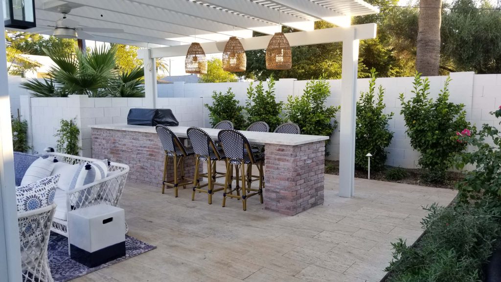 Patio kitchen - mid-sized farmhouse backyard tile patio kitchen idea in Phoenix with a pergola
