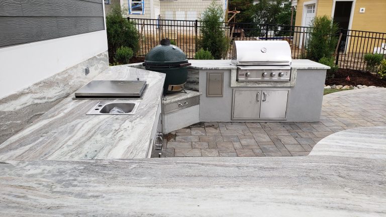 Patio kitchen - mid-sized modern backyard concrete paver patio kitchen idea in Other with no cover