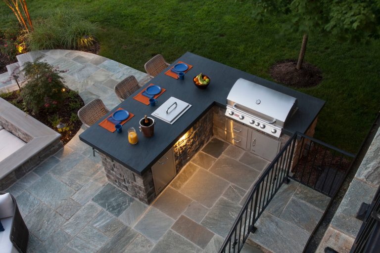 Patio kitchen - mid-sized modern backyard stamped concrete patio kitchen idea in DC Metro with no cover