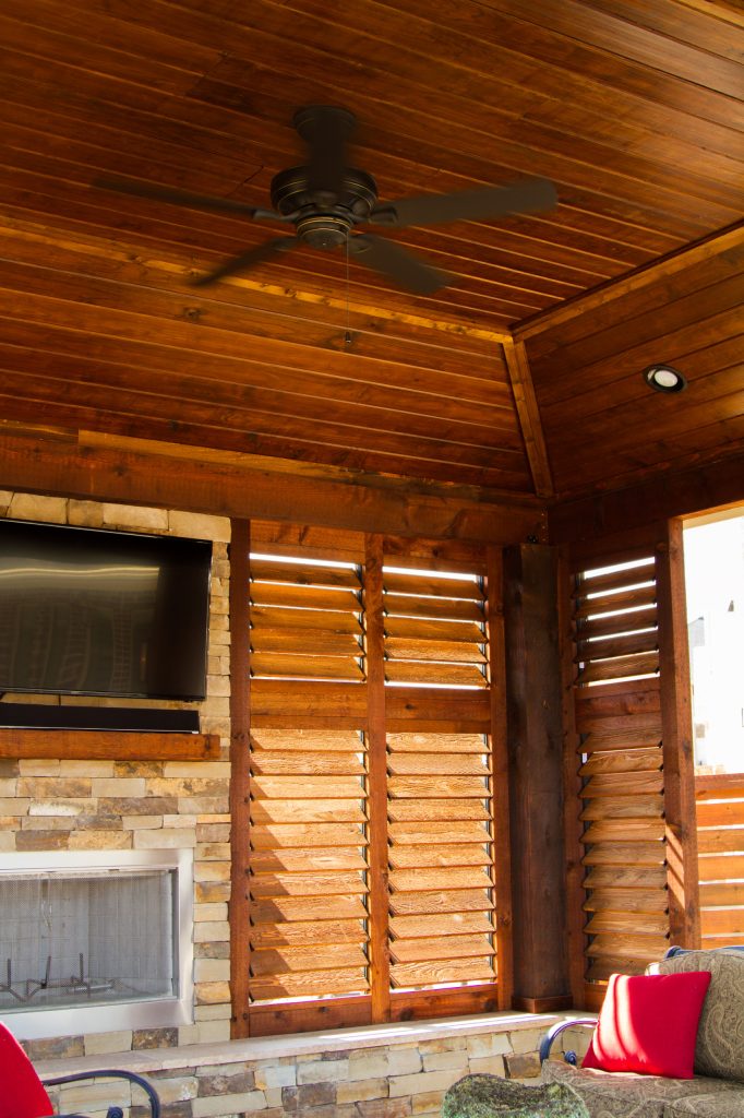 Patio kitchen - mid-sized rustic backyard concrete patio kitchen idea in Houston with a gazebo