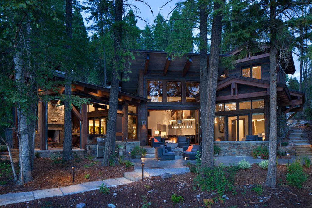 Patio kitchen - mid-sized rustic backyard stone patio kitchen idea in Other with no cover