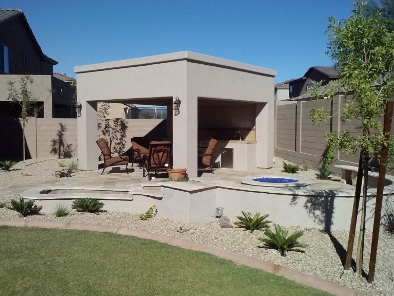 Patio kitchen - mid-sized southwestern backyard tile patio kitchen idea in Phoenix with a roof extension