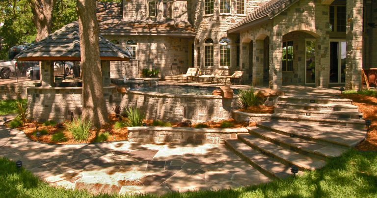 Patio kitchen - mid-sized traditional backyard concrete paver patio kitchen idea in Dallas with a gazebo