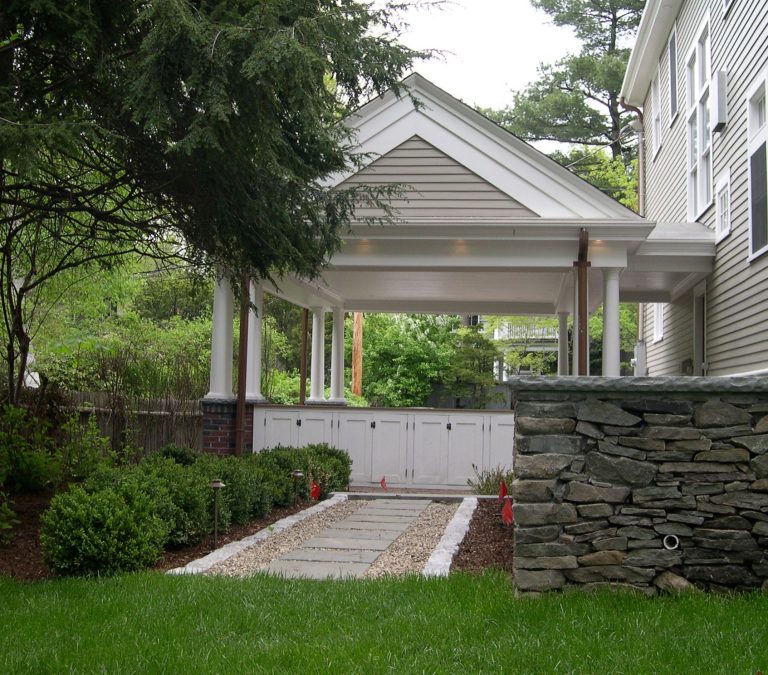 Patio kitchen - mid-sized traditional backyard patio kitchen idea in Boston with a roof extension