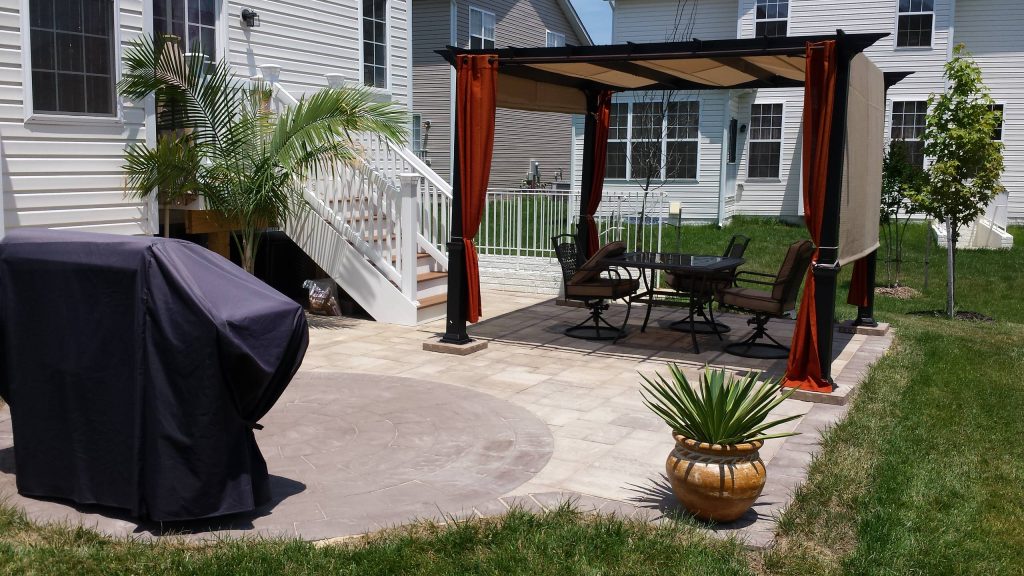 Patio kitchen - mid-sized traditional backyard tile patio kitchen idea in DC Metro with an awning