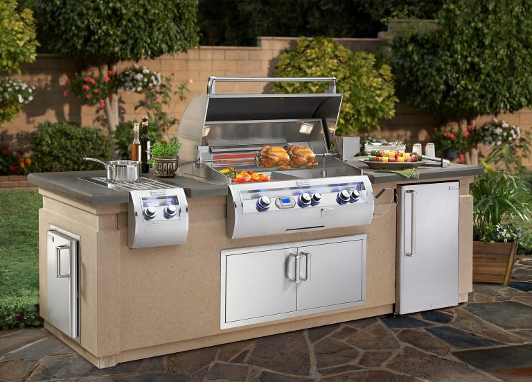 Patio kitchen - mid-sized transitional backyard stone patio kitchen idea in Los Angeles with no cover