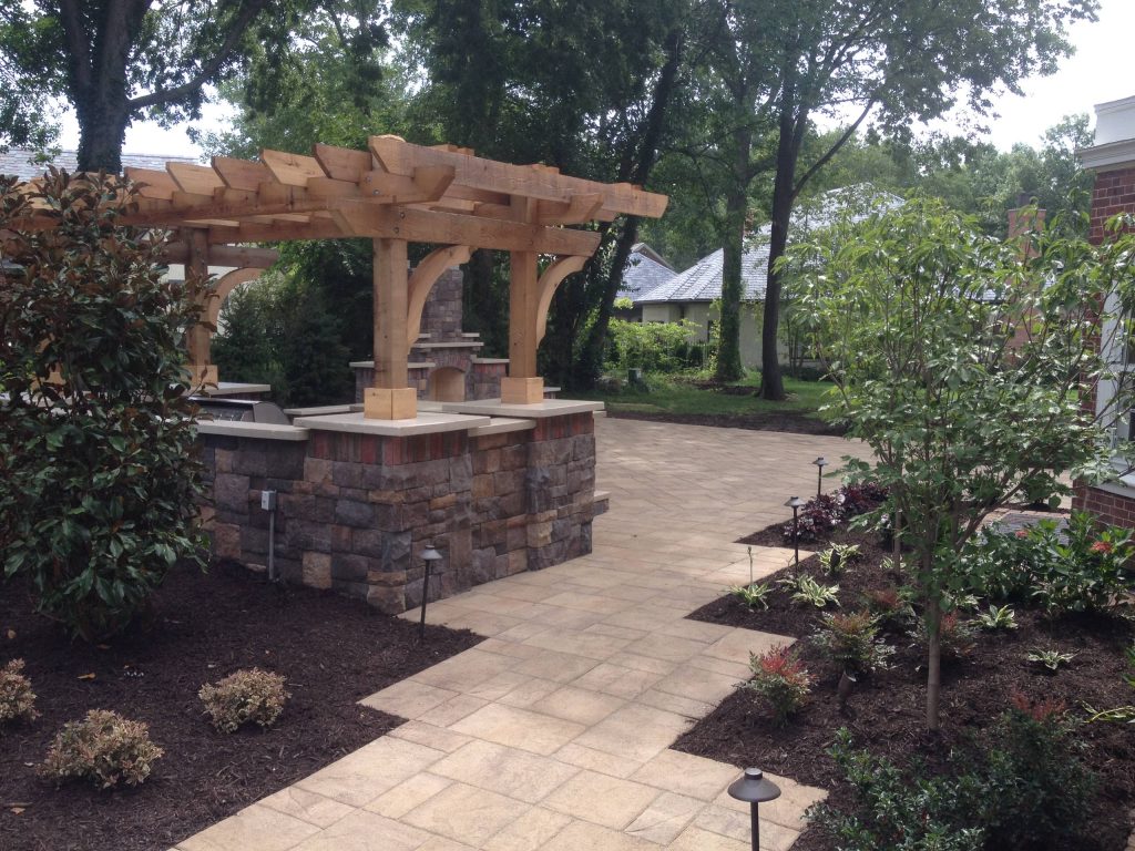 Patio kitchen - stone patio kitchen idea in Kansas City