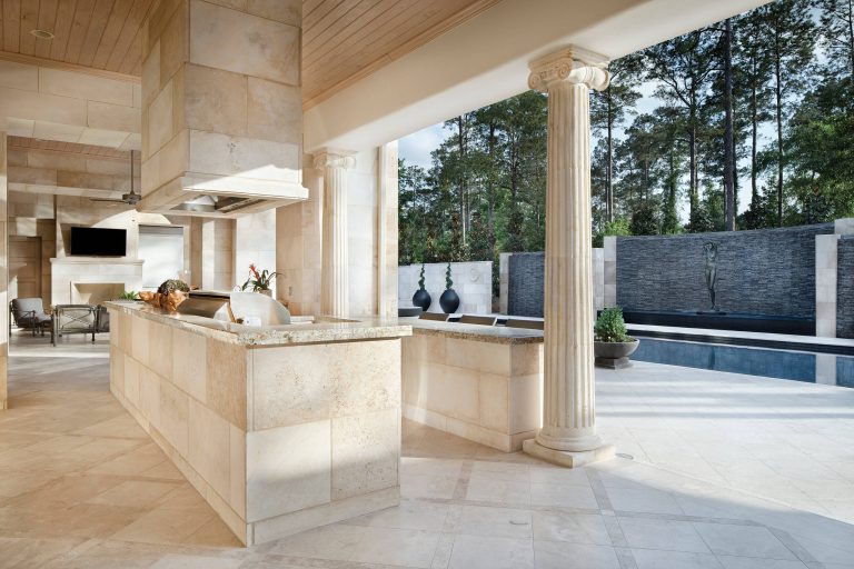 Patio kitchen - traditional backyard patio kitchen idea in Houston