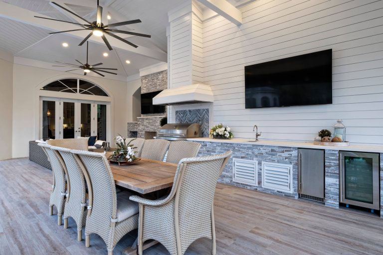 Patio kitchen - transitional backyard patio kitchen idea in Miami with a roof extension