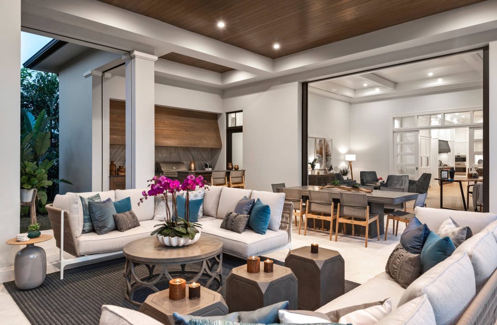 Patio kitchen - tropical backyard patio kitchen idea in Miami with a roof extension