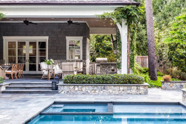 Patio seating outside the Family Room with custom 10' tall doors