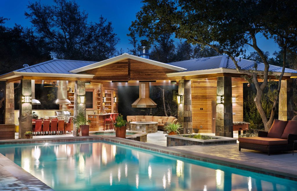 Pavilion at night.

I designed this outdoor living project when at CG&S, and it was beautifully built by their team.

Photo: Paul Finkel 2012Example of a huge transitional backyard concrete paver and custom-shaped pool house design in Austin by Gregory Thomas, Architect, AKBD, CG&S Design-Build | Pool design | Pool Contracting | Swimming Pool Ideas | Swimming Pool Design Ideas