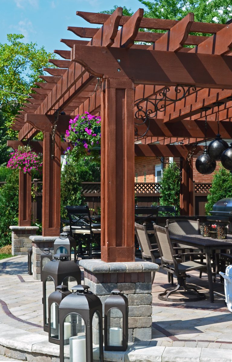 Pergola with Custom Iron Detail at Outdoor Kitchen