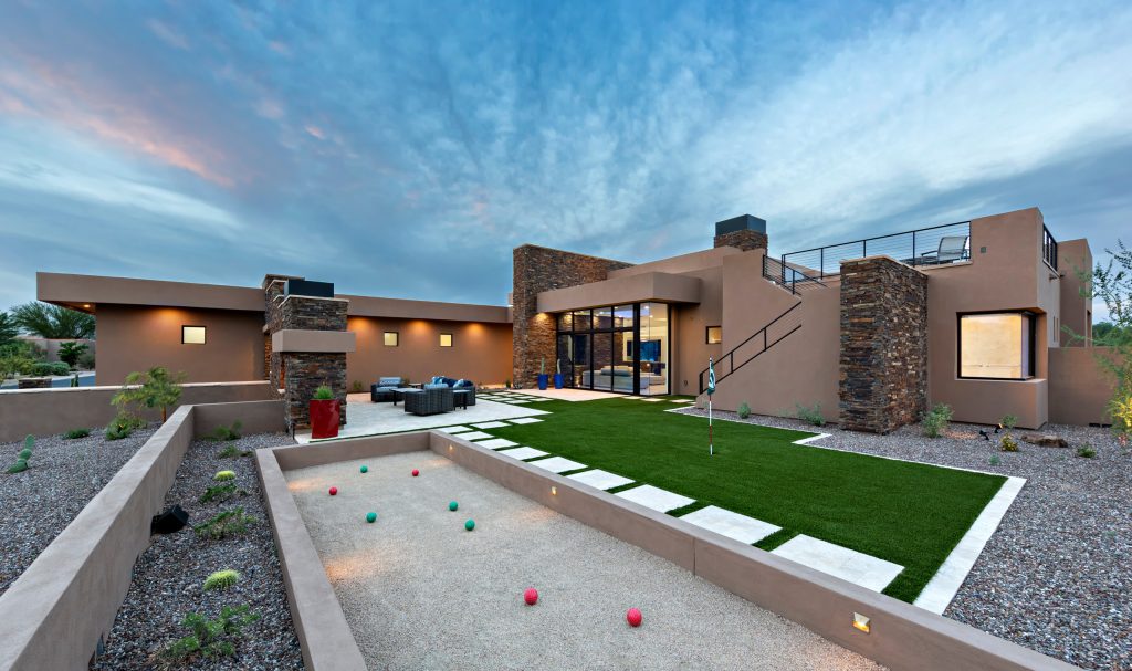 Photo of a contemporary full sun backyard gravel outdoor sport court in Phoenix.