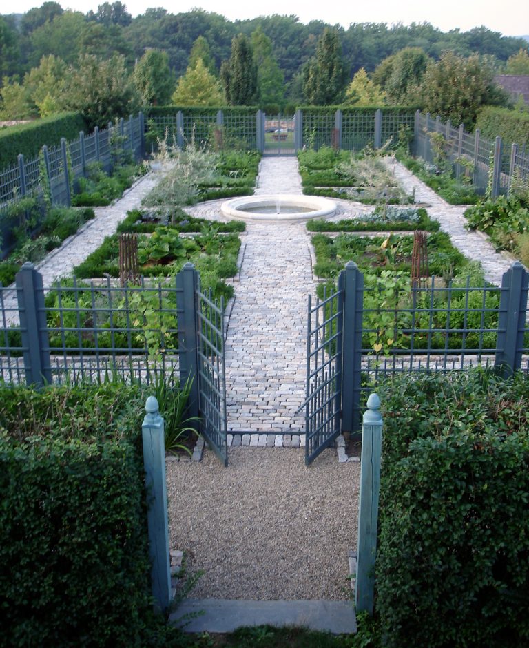 Photo of a large farmhouse backyard stone landscaping in New York.