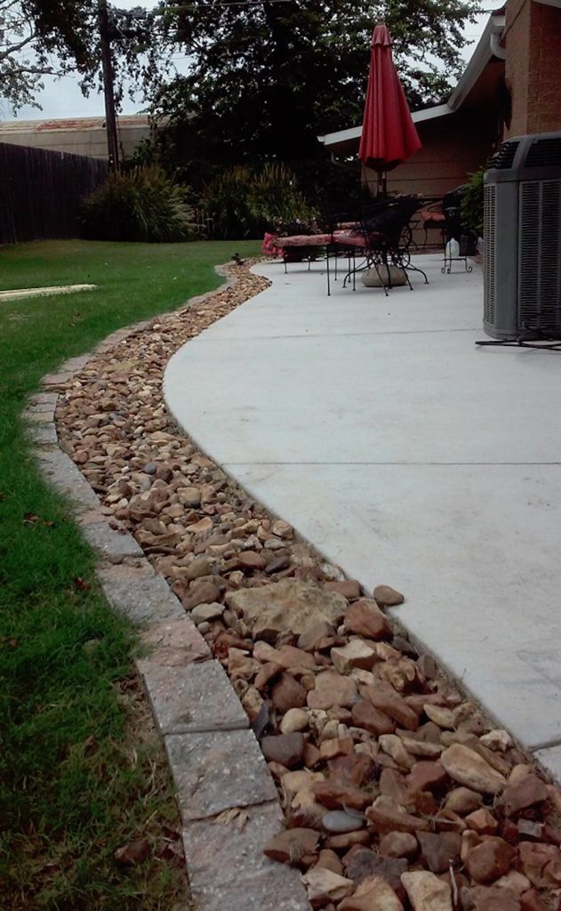 Photo of a large traditional full sun backyard gravel formal garden in Other for summer.