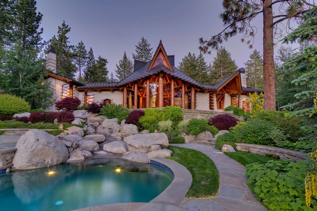 Photo of a rustic backyard stone landscaping in Toronto.