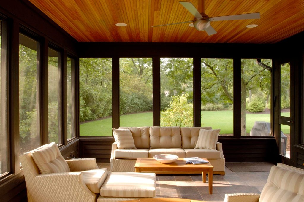 Photography by Linda Oyama Bryan. http://pickellbuilders.com. Cedar Sided Screened Porch with Stained Bead Board Ceiling and Porcelain Tile Floor by Orren Pickell Building Group | Outdoor Photos | Porch | Landscaping | Landscape Design | Outdoor Living Space | Porch Design Ideas | Outdoor Living Space Ideas | Backyard Design