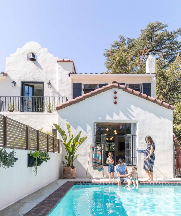 Pool and Spanish exterior of Sacramento Spanish house DIY renovation.