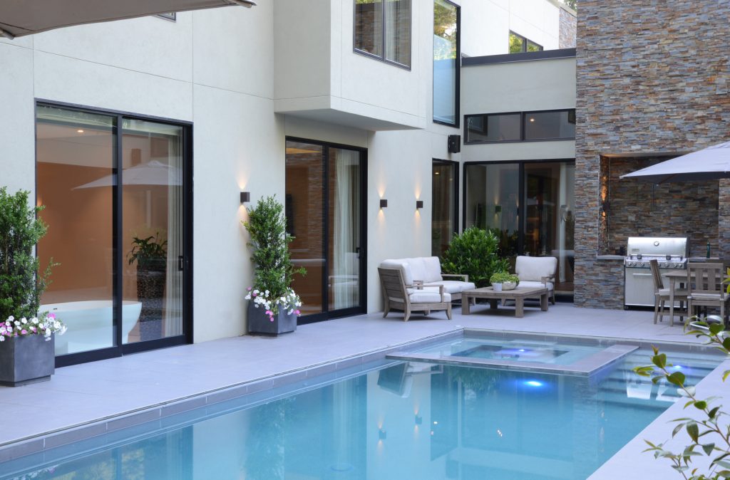 Pool and amenity deck is located on the second floor, above the first.