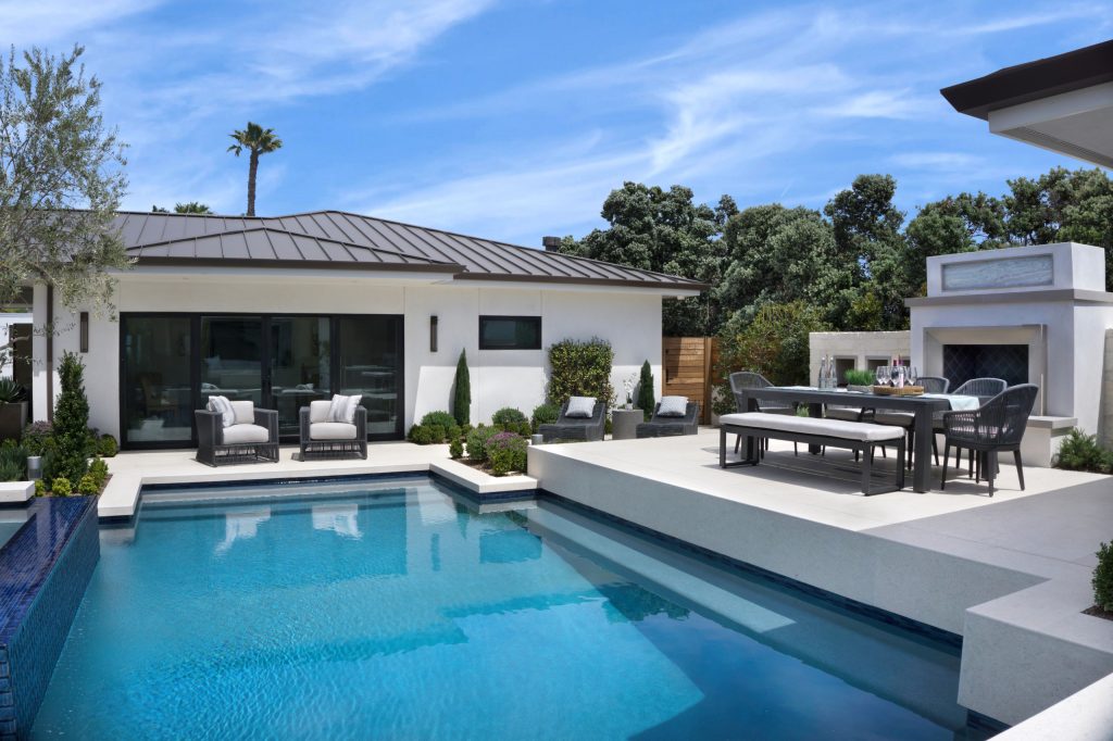 Pool - contemporary courtyard rectangular pool idea in Orange County